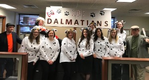 Bank employees dressed up as character from 101 Dalmatians